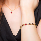 Classic Teardrop Link Bracelet in Silver with 24ct Gold & Garnet